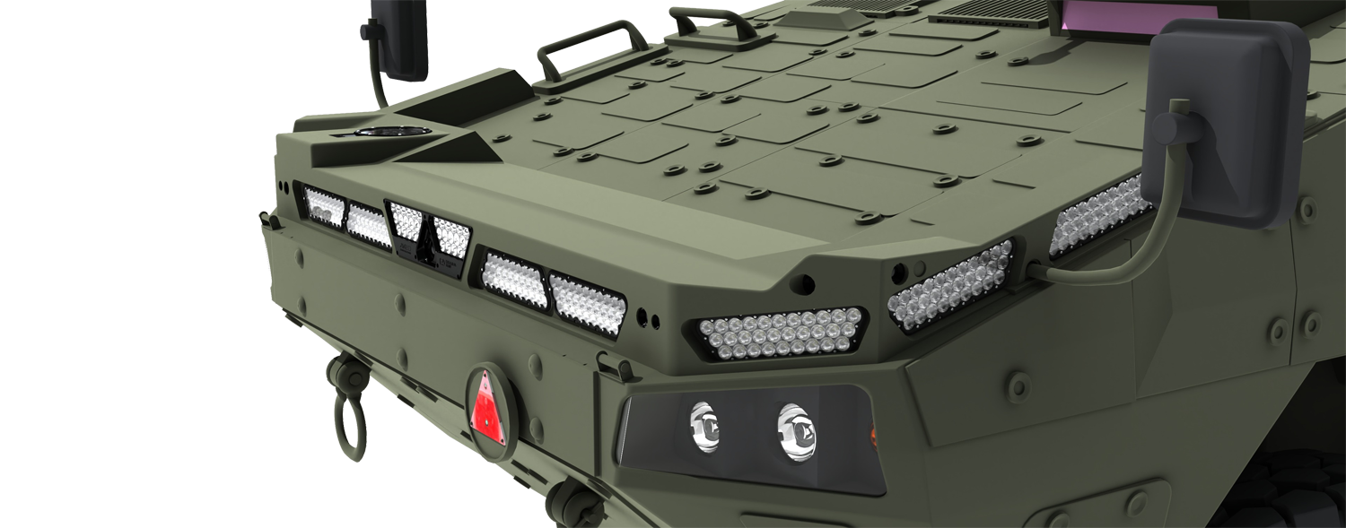 Aveo lighting array on the front of a green 8x8 armored vehicle
