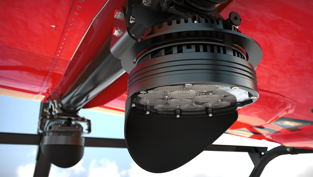 Aveo hoist light under a red helicopter