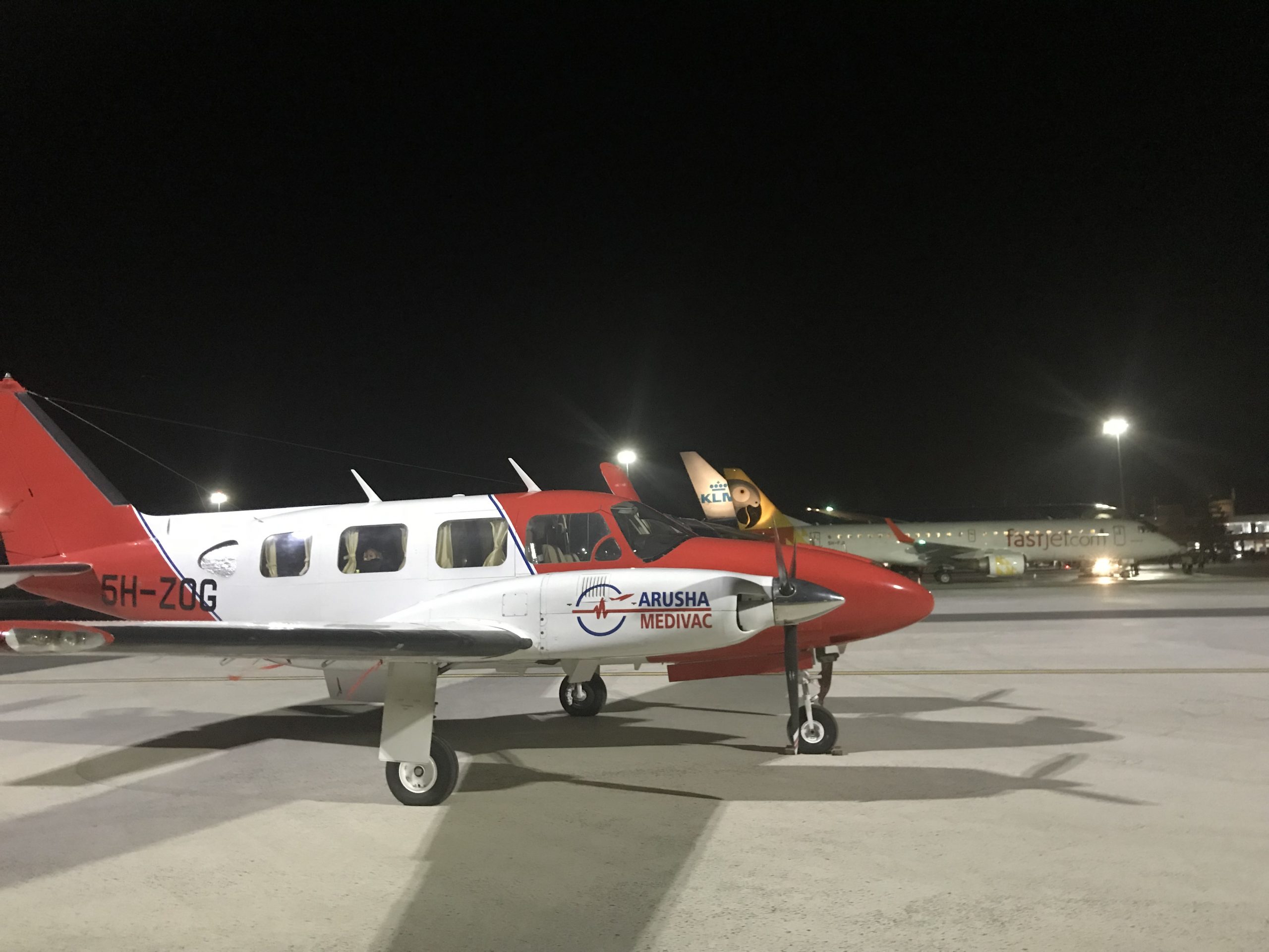 Arusha Medivac Piper 5H-ZOG on the ramp at night