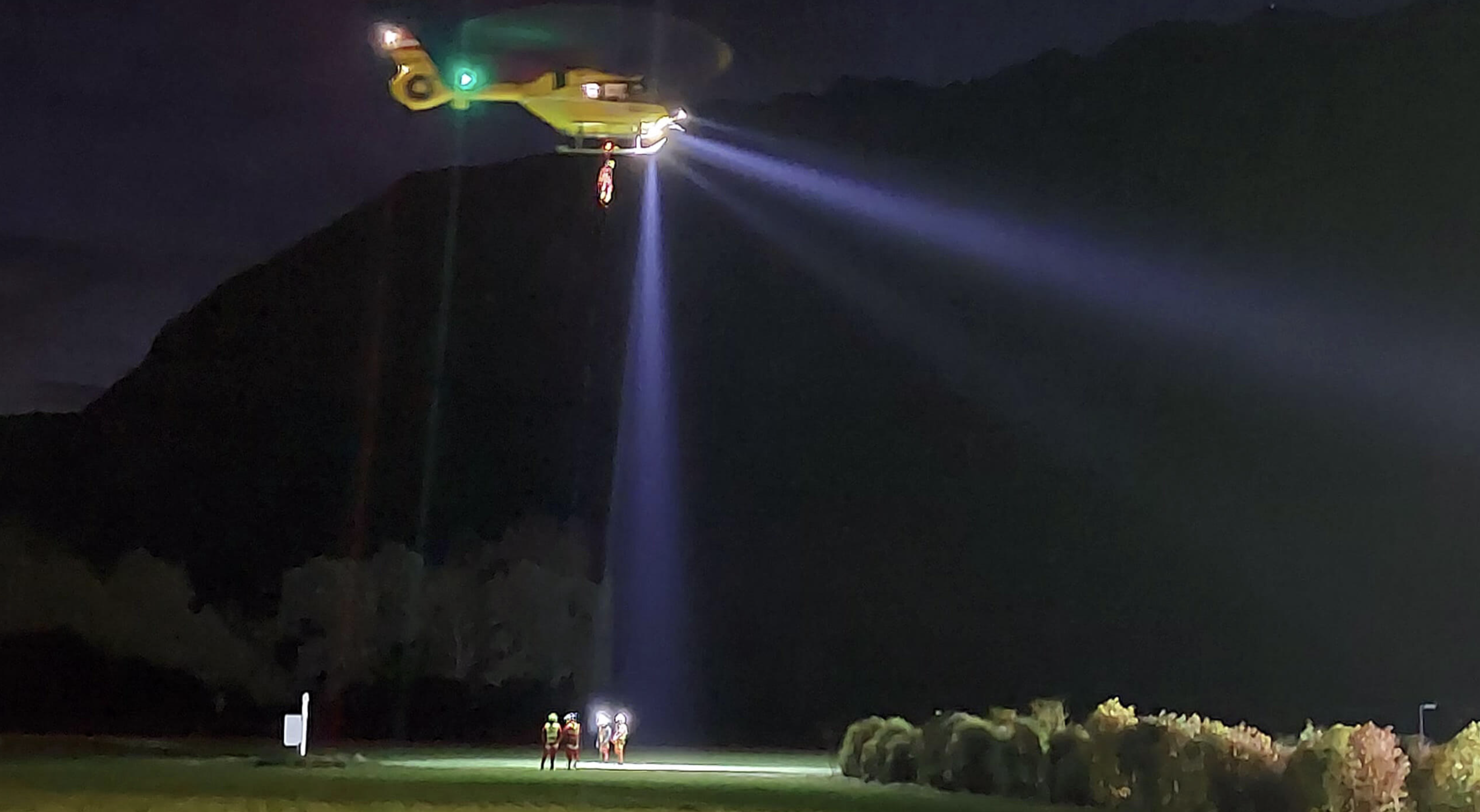 Night hoist rescue lit by Aveo searchlight